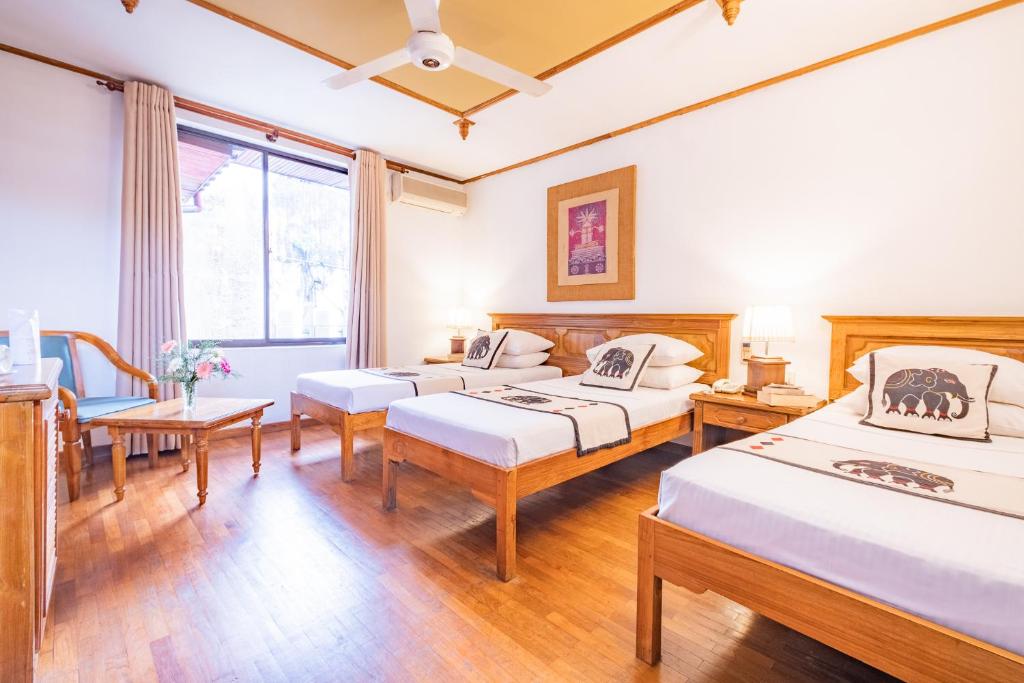 Postel nebo postele na pokoji v ubytování Hotel Casamara