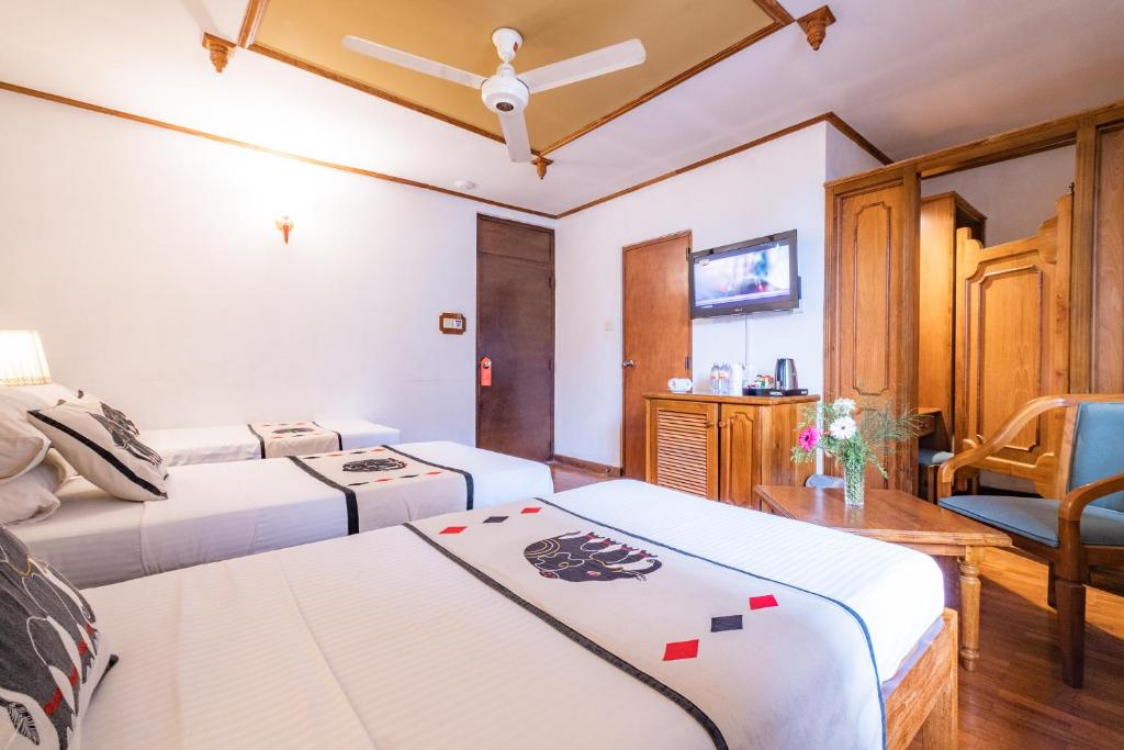 Postel nebo postele na pokoji v ubytování Hotel Casamara