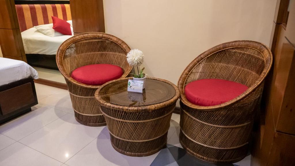 Postel nebo postele na pokoji v ubytování Fields Palace Hotel