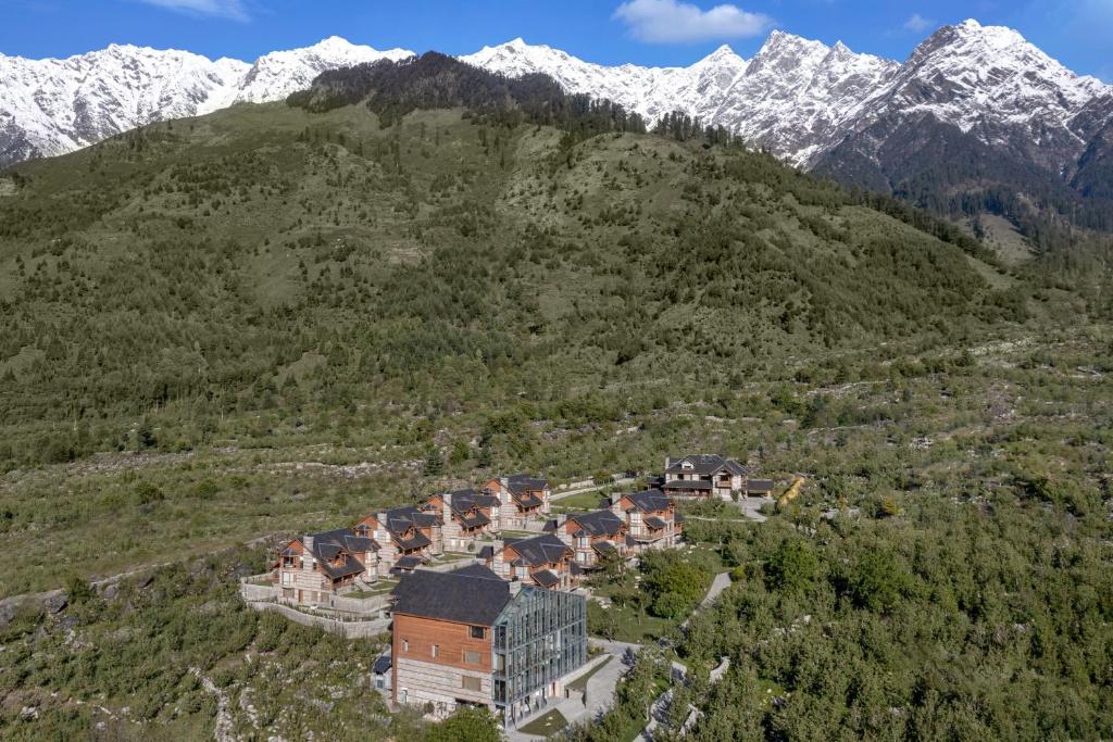 an aerial view of a resort in the mountains at Welcomhotel By ITC Hotels, Hamsa Manali in Manāli