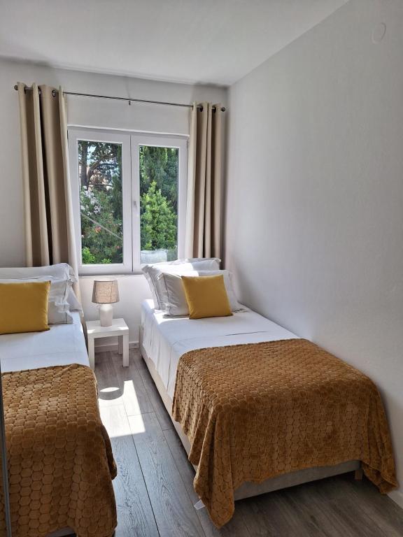 Posteľ alebo postele v izbe v ubytovaní Apartment Ivy