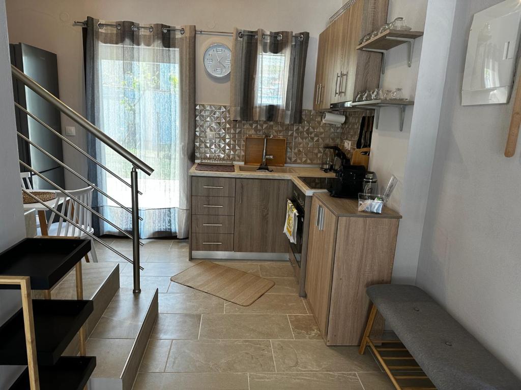 Kuchyň nebo kuchyňský kout v ubytování Limoncello Villas
