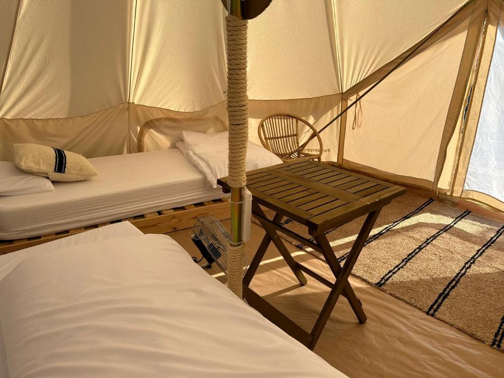 Postel nebo postele na pokoji v ubytování Camping Tauro