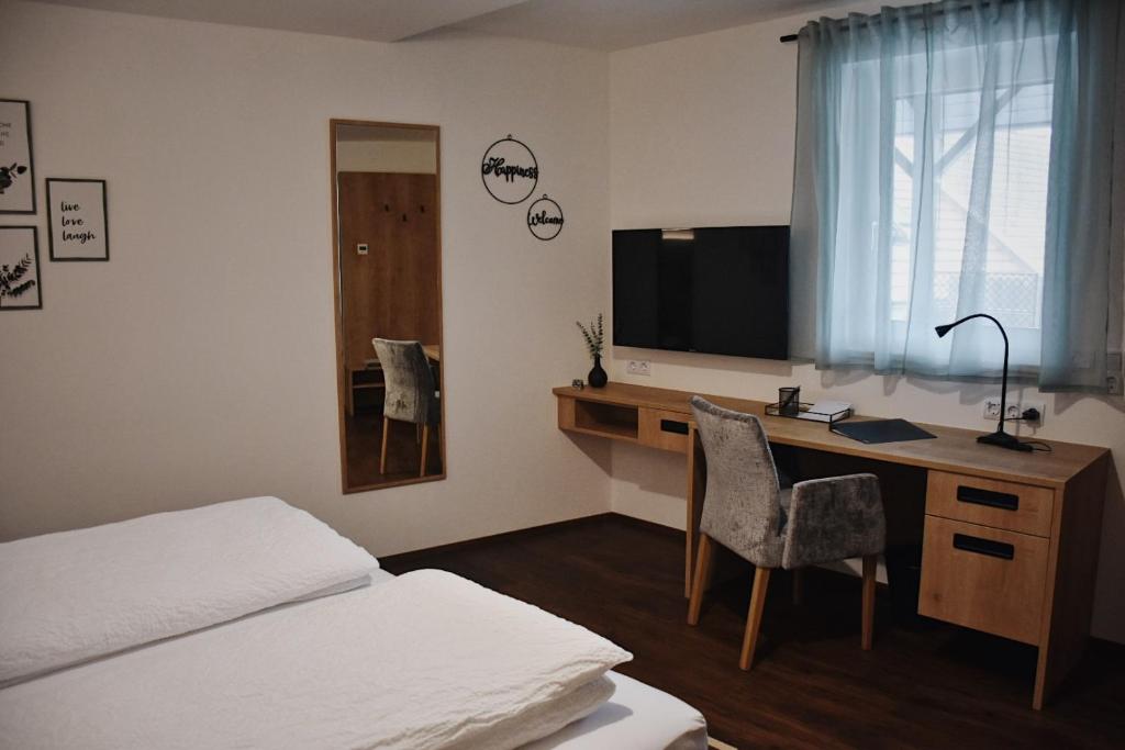 Postel nebo postele na pokoji v ubytování Das Joes Frühstückspension