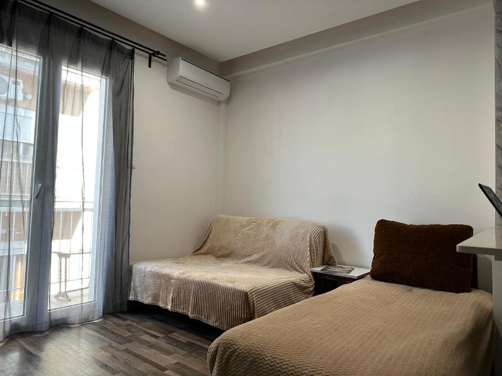 Postel nebo postele na pokoji v ubytování Apartment Center Piraeus location Kastella Passalimani Port