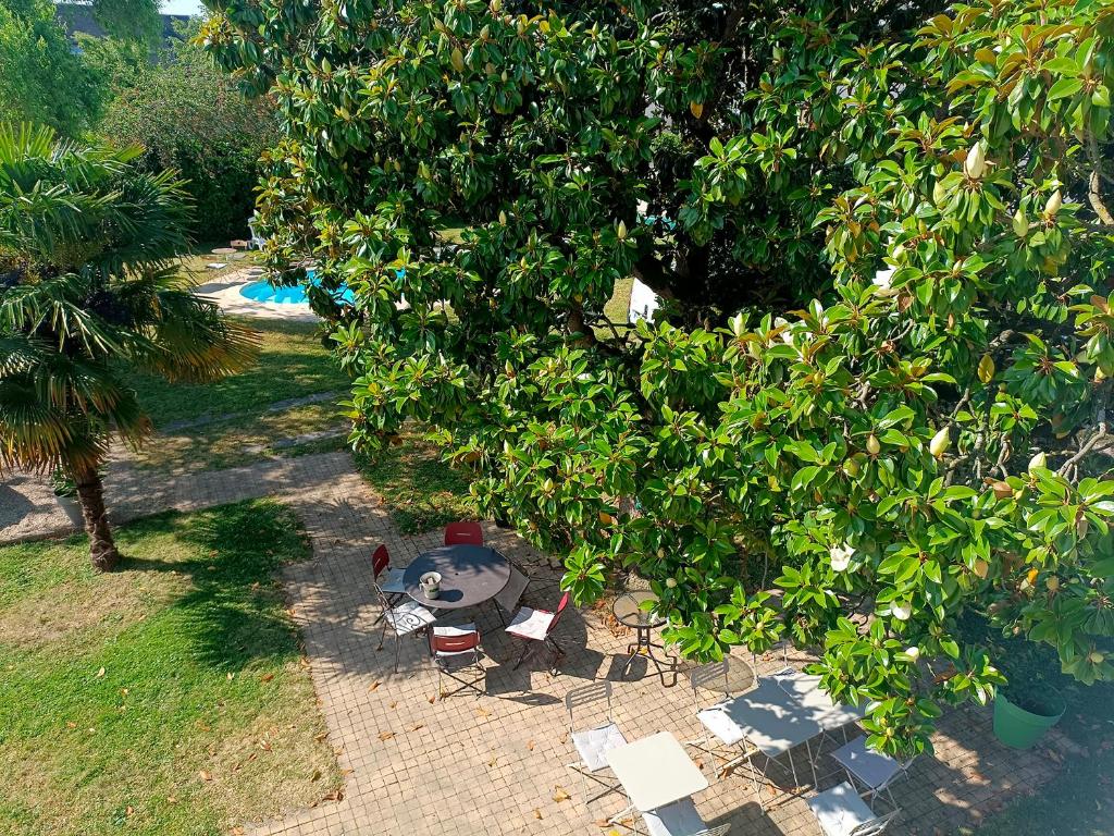 Vonkajšia záhrada v ubytovaní Le Magnolia, chambre d'hôte au calme