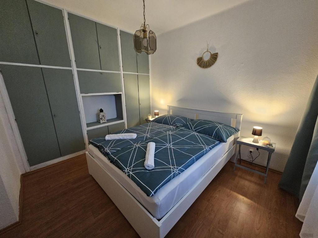 Postel nebo postele na pokoji v ubytování Babi Apartmanház
