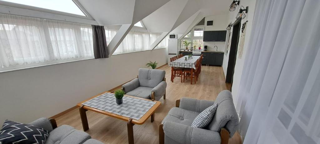 TV a/nebo společenská místnost v ubytování Babi Apartmanház