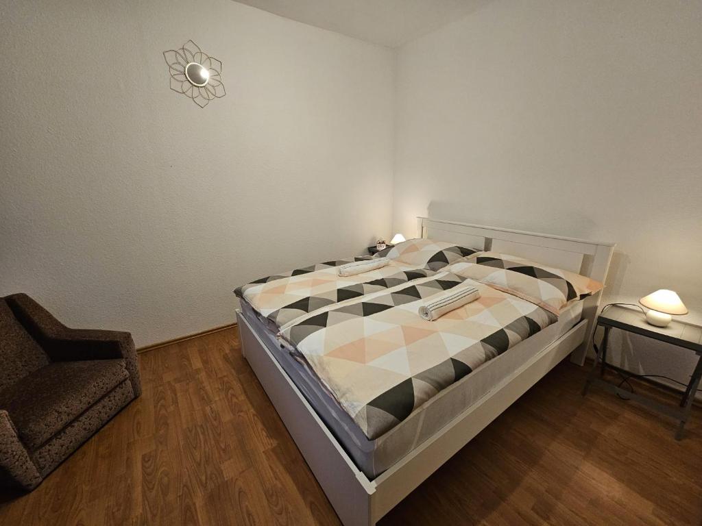 Postel nebo postele na pokoji v ubytování Babi Apartmanház