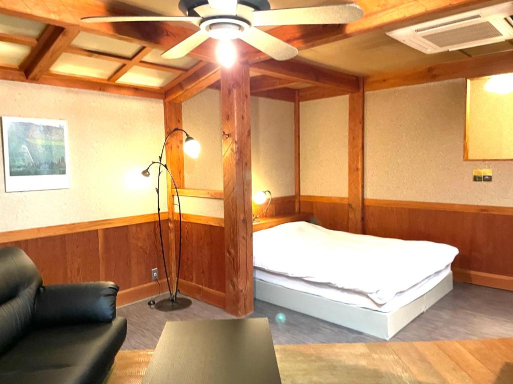Postel nebo postele na pokoji v ubytování Hotel Ai - coupls hotel