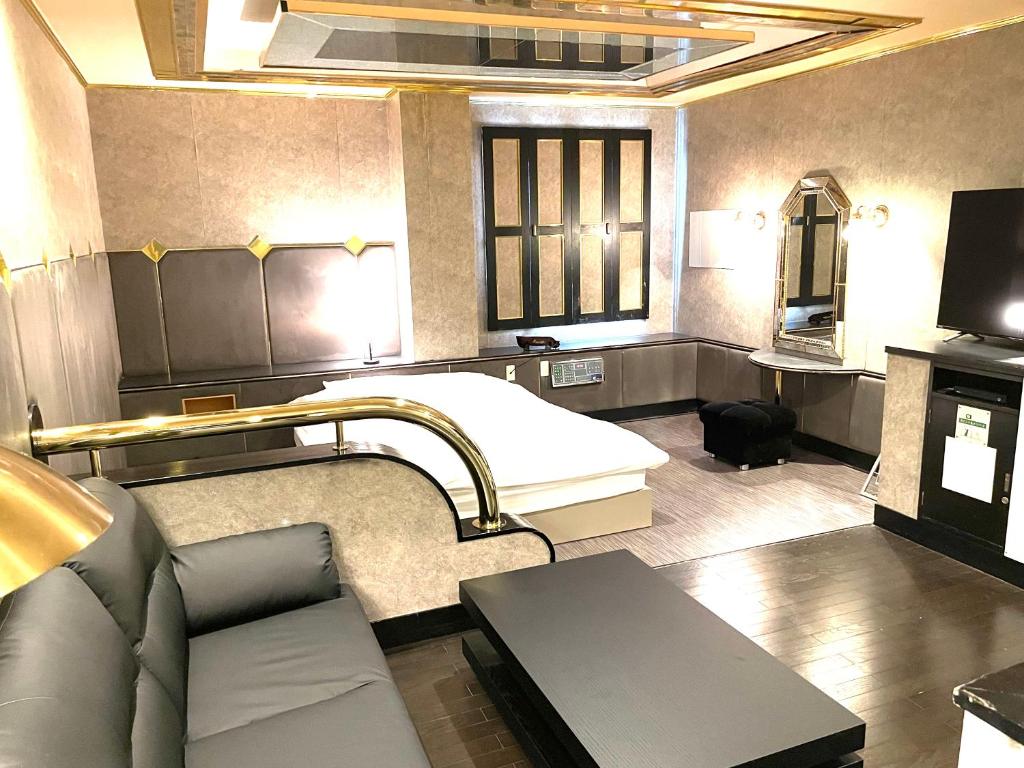 Postel nebo postele na pokoji v ubytování Hotel Ai - coupls hotel