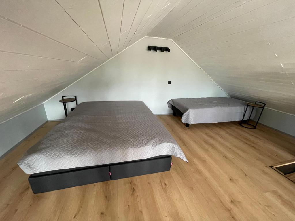 Postel nebo postele na pokoji v ubytování Peipsi Villad