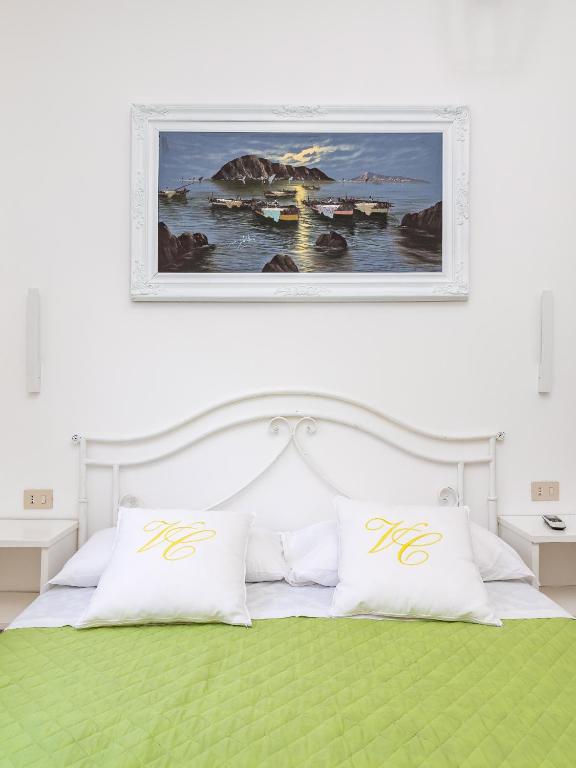 Łóżko lub łóżka w pokoju w obiekcie Villa Cristina - De Vivo Realty Piano di Sorrento