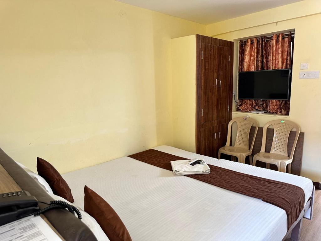 TV a/nebo společenská místnost v ubytování Hotel Ramakrishna