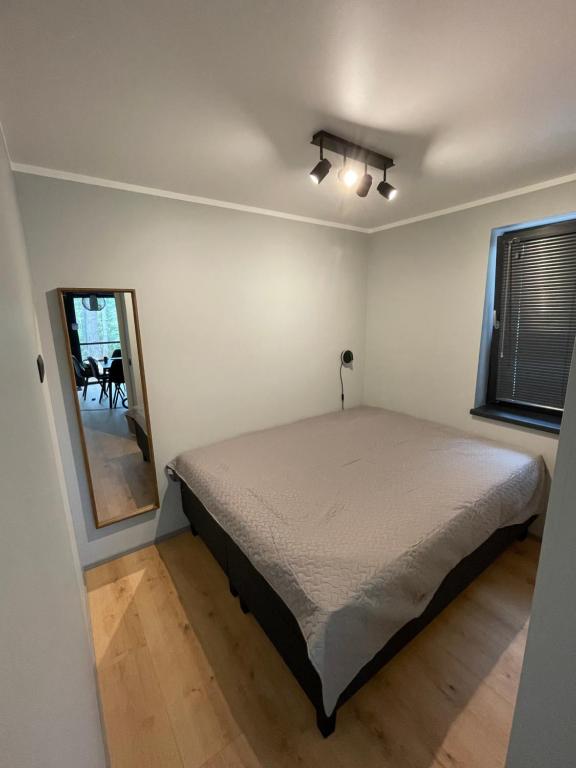 Postel nebo postele na pokoji v ubytování Peipsi Villad