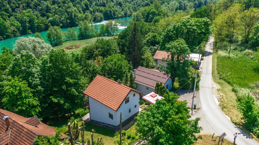 an aerial view of a house with a road and a river at Weeksa Vacation Home in Duga Resa