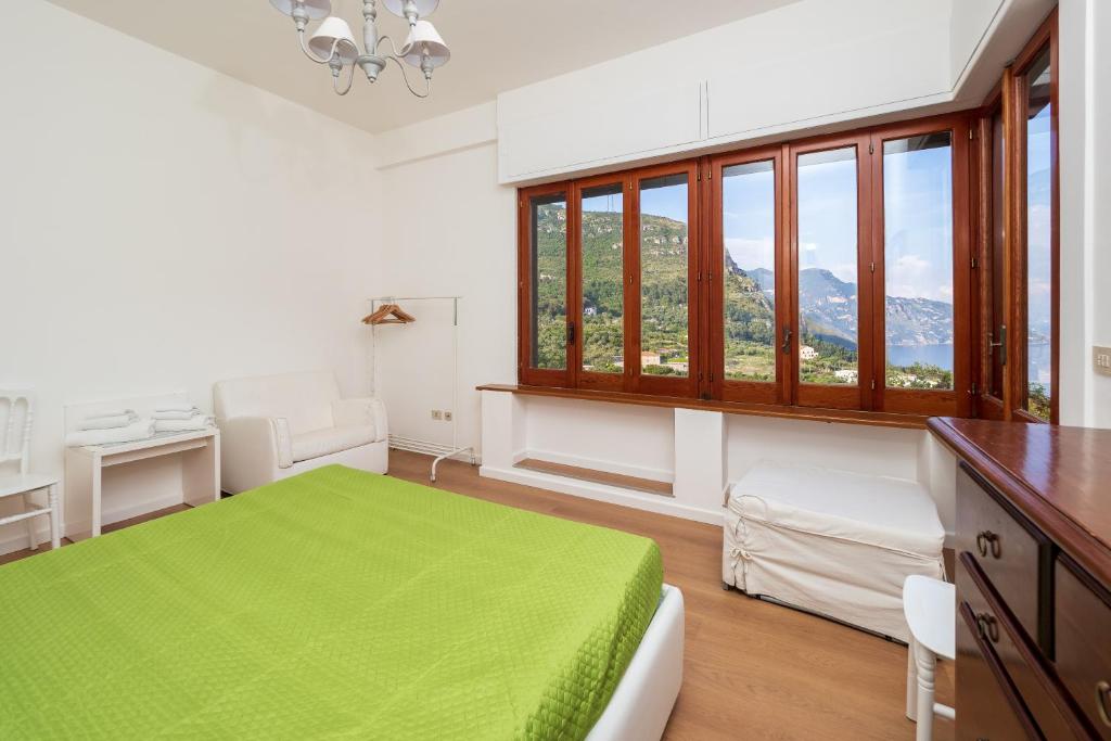 Łóżko lub łóżka w pokoju w obiekcie Villa Cristina - De Vivo Realty Piano di Sorrento