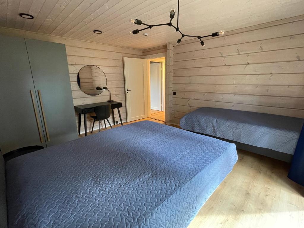Postel nebo postele na pokoji v ubytování Peipsi Villad