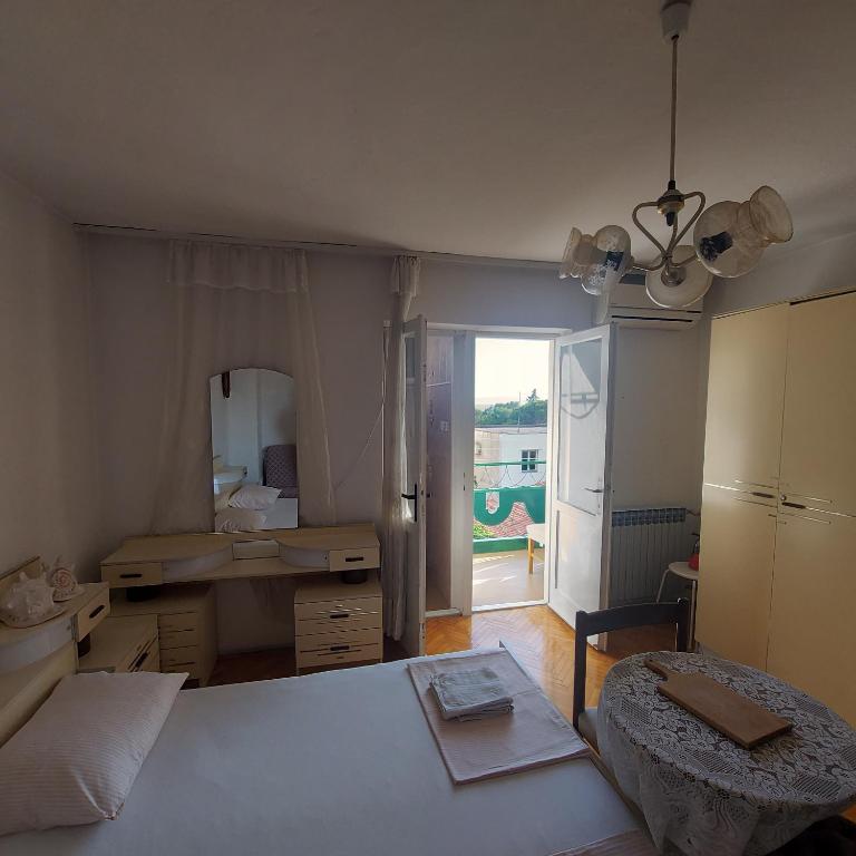 Posteľ alebo postele v izbe v ubytovaní The best location in Makarska,free P, option bikes