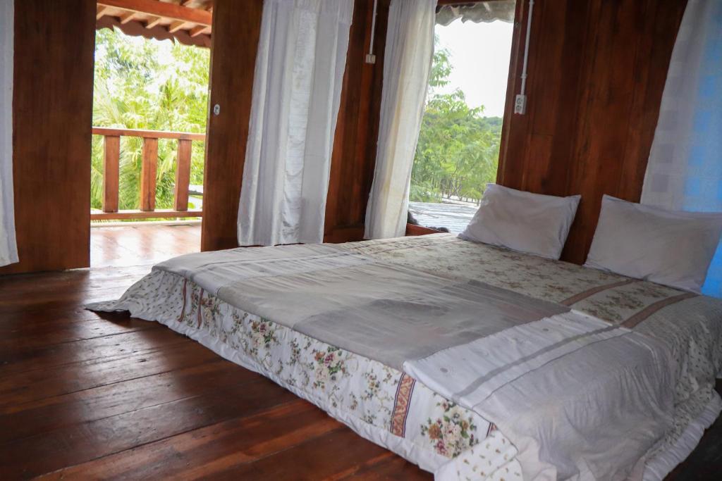 Кровать или кровати в номере Bale Villa Central Lombok