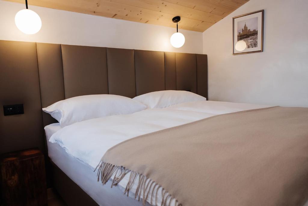 Postel nebo postele na pokoji v ubytování Boutique Hotel Panorama
