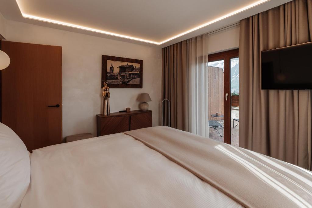 TV a/nebo společenská místnost v ubytování Boutique Hotel Panorama