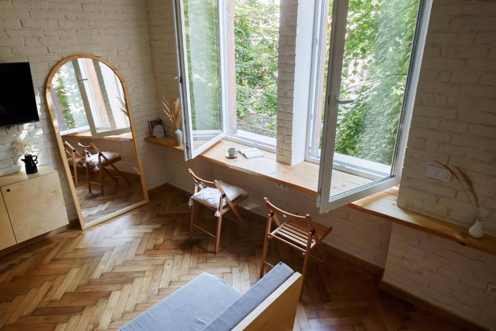 TV a/nebo společenská místnost v ubytování Passage Apartment
