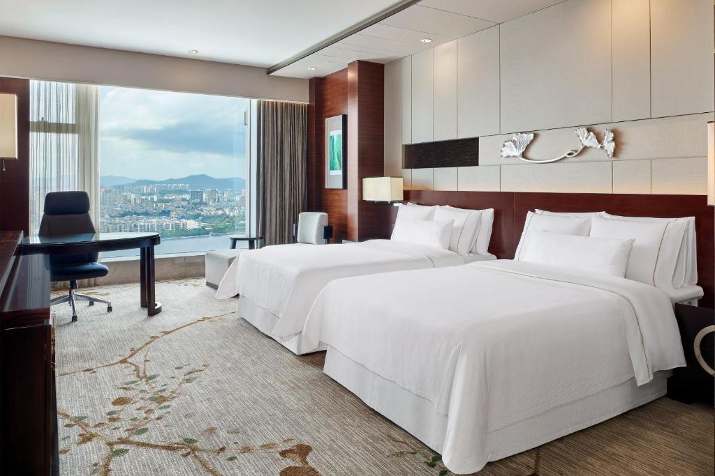 Postel nebo postele na pokoji v ubytování The Westin Pazhou