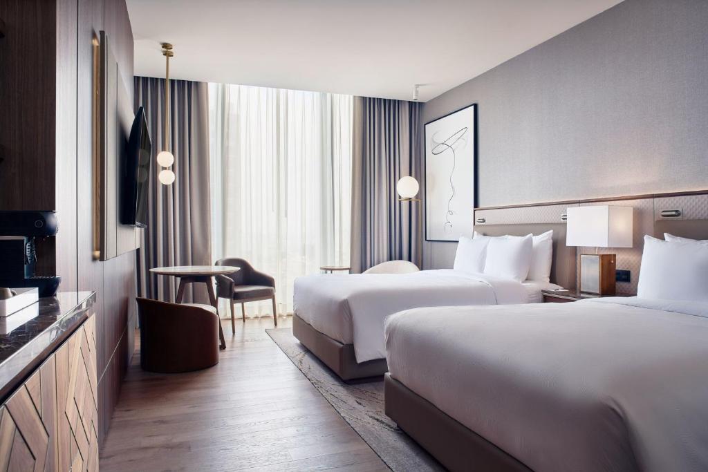 Postel nebo postele na pokoji v ubytování JW Marriott Hotel Guadalajara