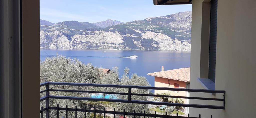 a view of a lake from a balcony at APPARTAMENTO LECCINO in Malcesine