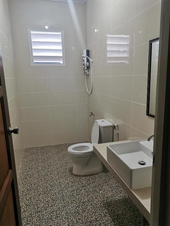 Koupelna v ubytování Sandakan Sim Sim Homestay