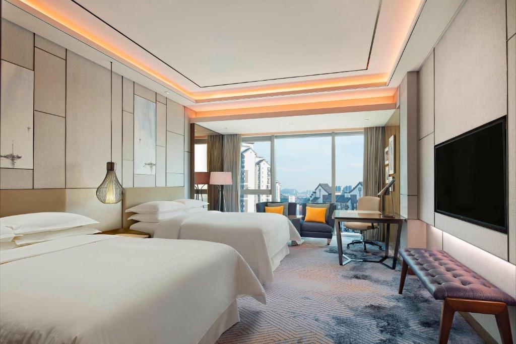 TV a/nebo společenská místnost v ubytování Sheraton Guangzhou Nansha Hotel