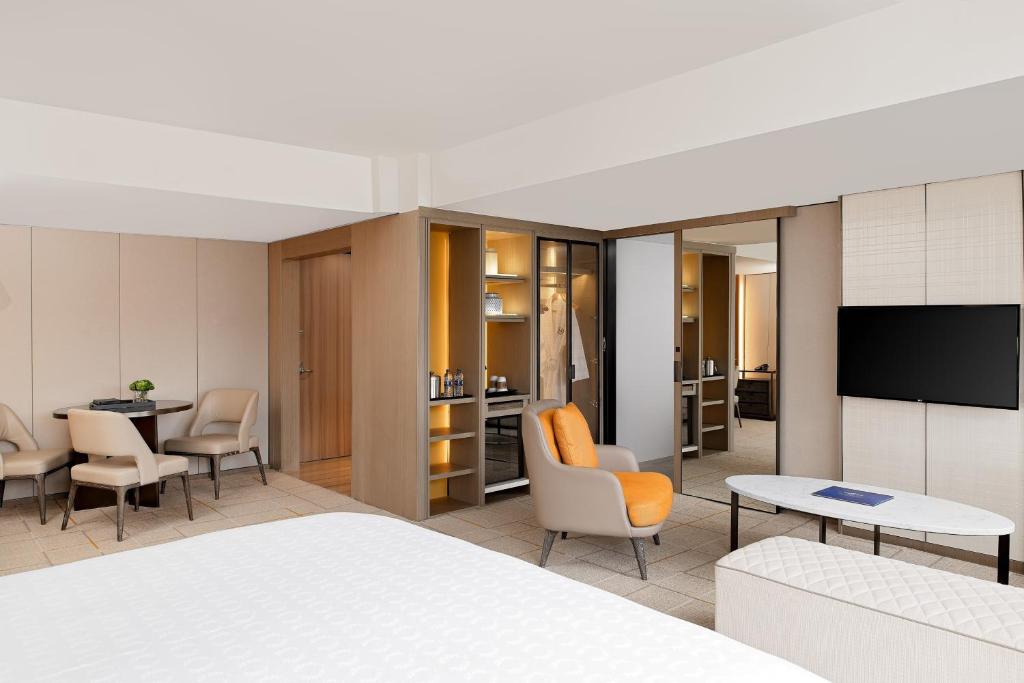 Postel nebo postele na pokoji v ubytování Sheraton Universal