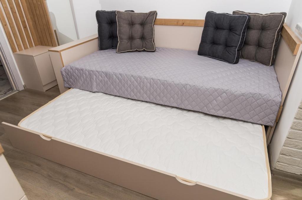 Postel nebo postele na pokoji v ubytování Alagen Apartments Burgas