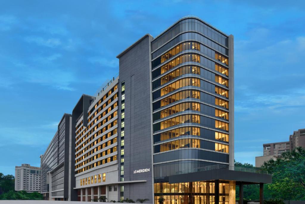 a rendering of a building with lights on at Le Meridien Hyderabad in Hyderabad