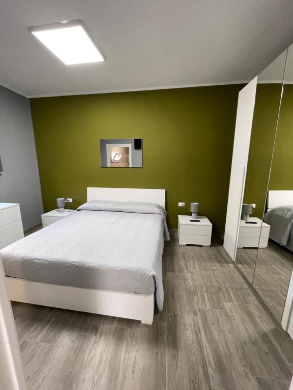 Postel nebo postele na pokoji v ubytování RESIDENCE GORDON