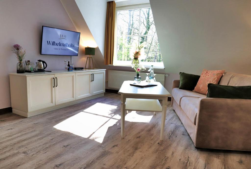 TV a/nebo společenská místnost v ubytování Hotel Wilhelmshöhe