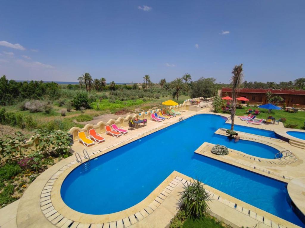 Bazén v ubytování Tunis Pyramids Hotel - فندق اهرامات تونس nebo v jeho okolí