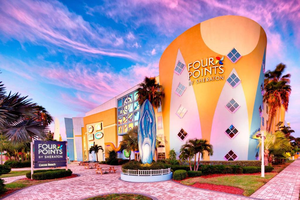 a rendering of the front of a disney resort at Four Points by Sheraton Cocoa Beach in Cocoa Beach