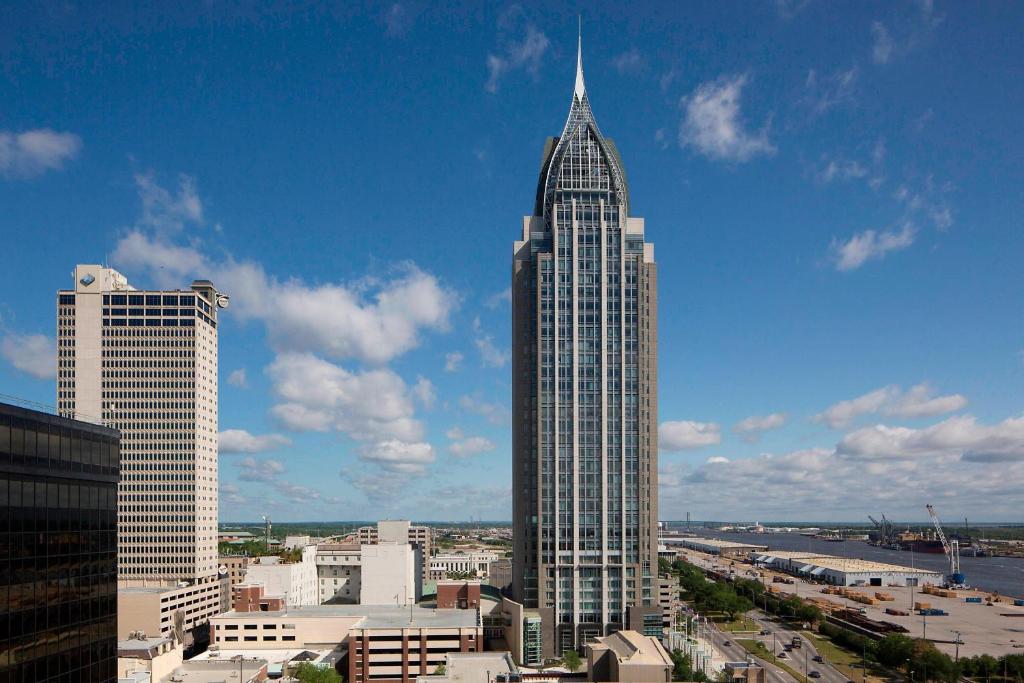 a tall skyscraper with a point on top of it at Renaissance Mobile Riverview Plaza Hotel in Mobile