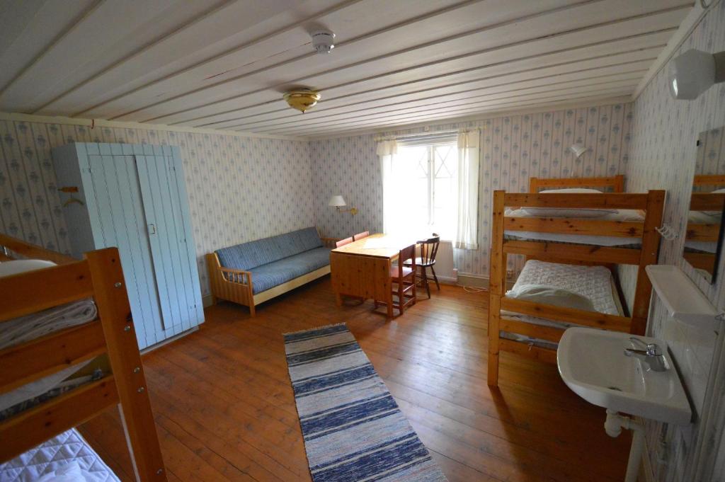 Postel nebo postele na pokoji v ubytování Statarlängan Hörnefors