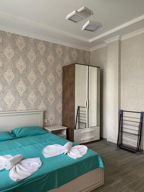 Postel nebo postele na pokoji v ubytování House on Moryakov 55