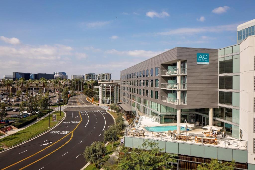 an aerial view of a building and a road at AC Hotel by Marriott Irvine in Irvine