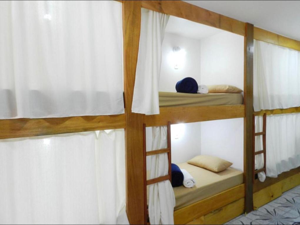 Postel nebo postele na pokoji v ubytování Utopia Hostel
