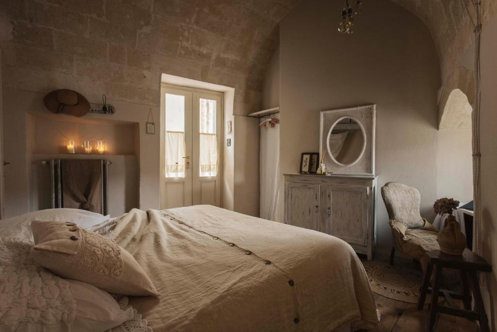 Postel nebo postele na pokoji v ubytování Corte San Leonardo