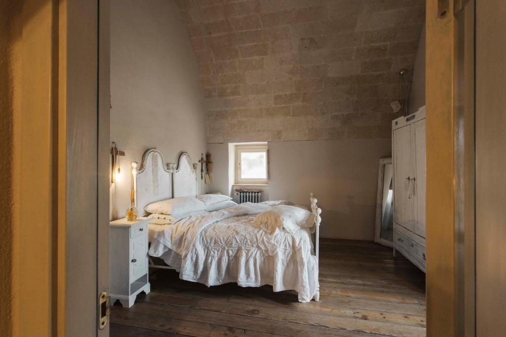 Postel nebo postele na pokoji v ubytování Corte San Leonardo