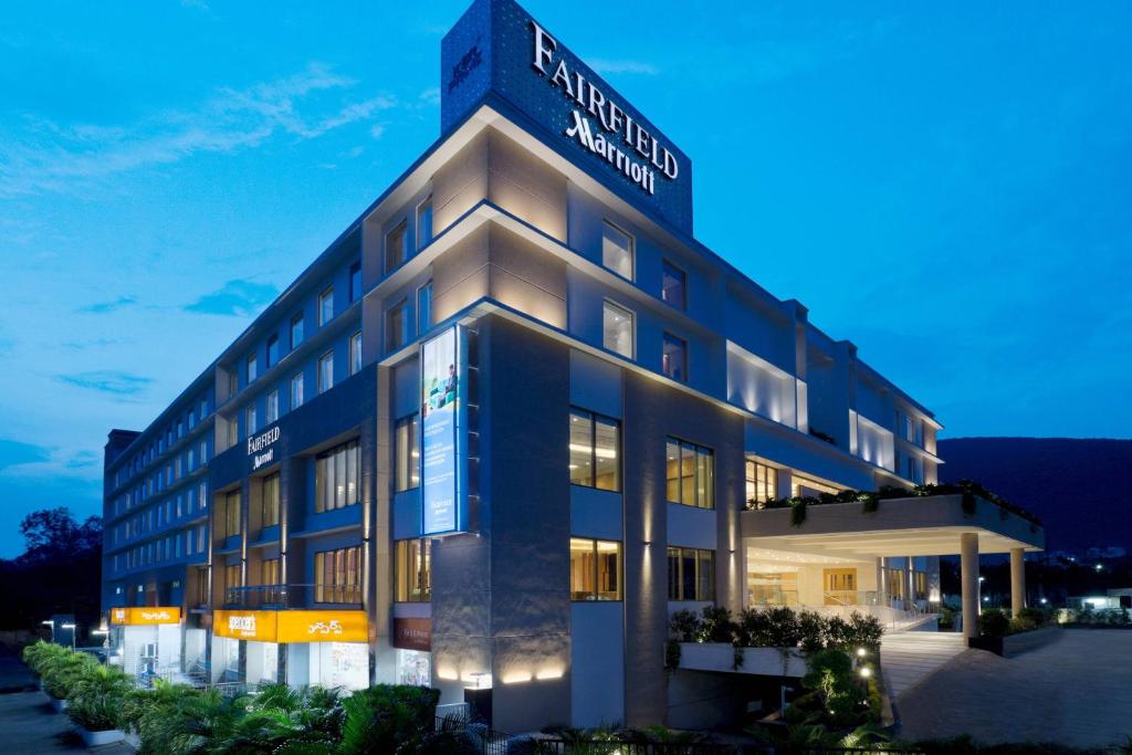 a building with a sign on the top of it at Fairfield by Marriott Visakhapatnam in Visakhapatnam