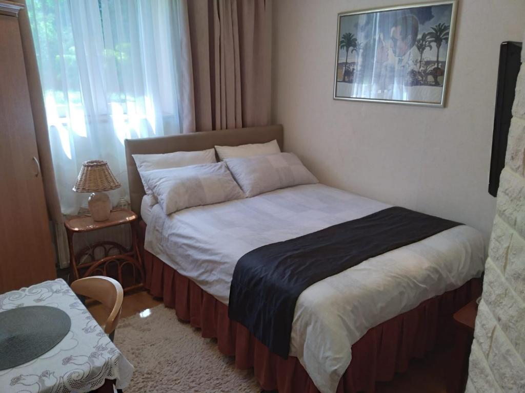 Posteľ alebo postele v izbe v ubytovaní Casablanca Pokoje i Apartamenty