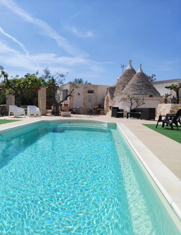 Bazén v ubytování Trulli bella vite nebo v jeho okolí