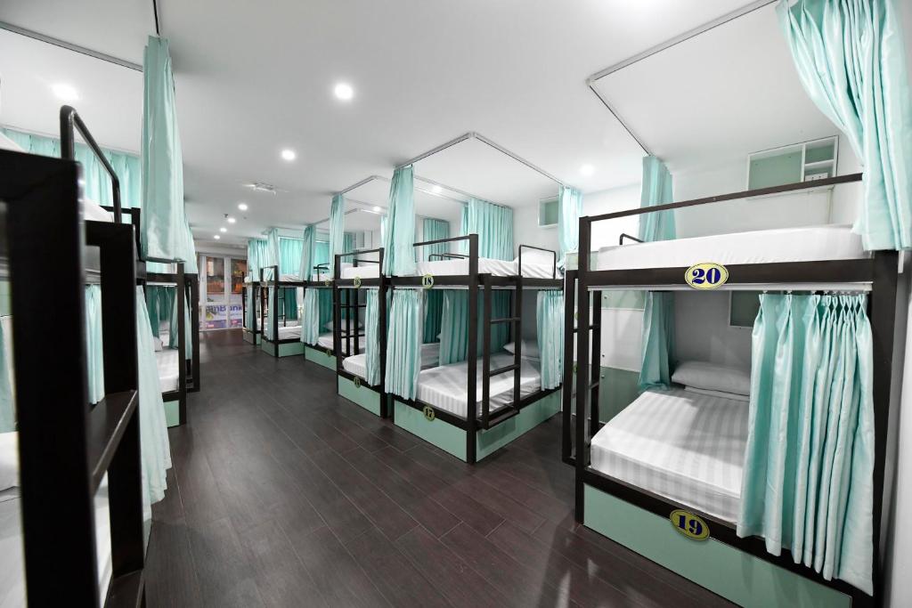 Postel nebo postele na pokoji v ubytování Hanoi Traveller House